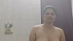 Sexy lady showing her hot figure in bathroom