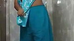 Aunty show her boobs  pussy in bathroom  again wear dress