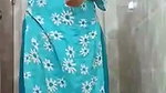 Aunty show her boobs  pussy in bathroom  again wear dress