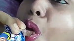 beautiful aunty showing boobs  eating chocolate