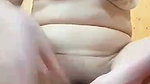 Sexy girl inserting cream tub in her pussy