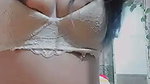 Bitch showing her boobs and ass