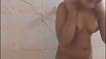 Cute babe making video of fingering and bathing