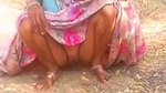 Village lady pissing outside  showing