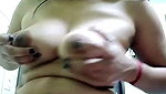 Sexy bhabhi pressing her boobs  showing