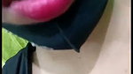 Sexy girl sucking her own boobs