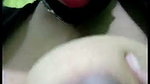 Sexy girl sucking her own boobs