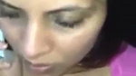 Wife talking on mobile with husband  giving Blowjob to lover