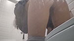 Beautiful girl pissing in mall toilet