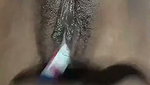 Sexy lady inserting marker pen in her pussy