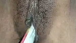 Sexy lady inserting marker pen in her pussy