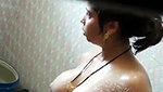 Beautiful girl bathing  showing boobs
