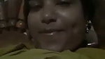 Desi aunty pressing her boobs  showing