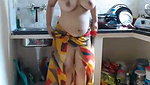 Sexy aunty showing her huge boobs in kitchen room