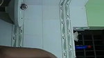 Sister show her boobs  pissing in bathroom