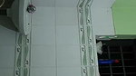 Sister show her boobs  pissing in bathroom