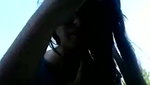 Sexy girl riding her boyfriend in open field