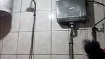 Sexy aunty taking bath  showing  boobs