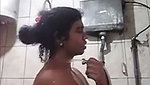Sexy aunty taking bath  showing  boobs