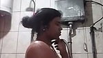 Sexy aunty taking bath  showing  boobs