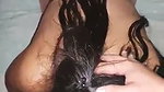 Slapping and playing with her