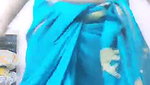 Aunty dancing in blue saree  showing her asshole