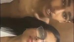 Sexy glasses babe giving blowjob to her bf