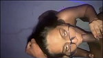 Sexy glasses babe giving blowjob to her bf