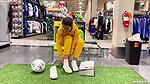 A girl walks around the store with her bare tits out