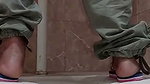 pissing on toilet