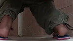 pissing on toilet