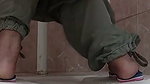 pissing on toilet