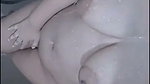 Hot lady showing her huge boobs while bathing