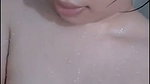 Hot lady showing her huge boobs while bathing