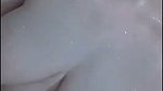 Hot lady showing her huge boobs while bathing