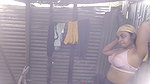 Village girl taking bath  showing her boobs