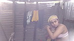 Village girl taking bath  showing her boobs