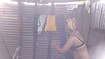 Village girl taking bath  showing her boobs