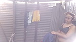 Village girl taking bath  showing her boobs