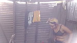 Village girl taking bath  showing her boobs