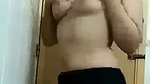 Beautiful sexy girl showing her boobs in bathroom