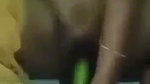 Bengali girl inserting cucumber in her pussy