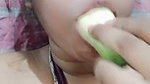 Nepali girl sucking cucumber