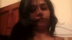Beautiful girl showing her boobs  pressing