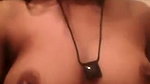 Beautiful girl showing her boobs  pressing
