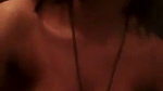 Beautiful girl showing her boobs  pressing