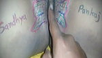Husband drawing butterfly of his wife pussy