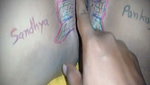 Husband drawing butterfly of his wife pussy