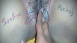 Husband drawing butterfly of his wife pussy