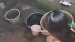 Aunty taking bath  nephew watching